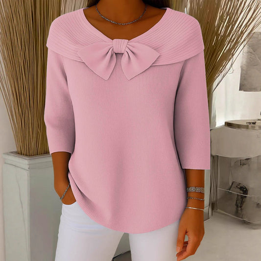 blouse uni orné d’un délicat nœud